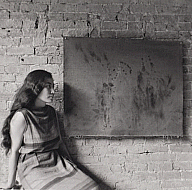 George Maciunas and Yoko Ono, Yoko Ono with Painting to See in the Dark (Version 1) (1961), 1961, printed 1993